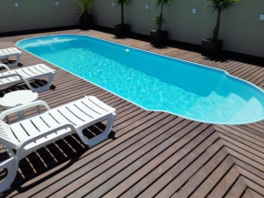 CASA AMBAR COM PISCINA EM Mariscal BOMBINHAS N 705